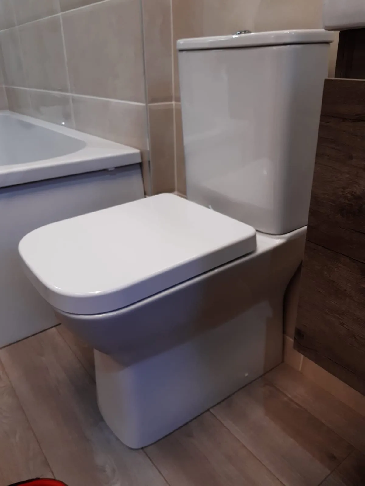 Newly fitted toilet in a renovated bathroom